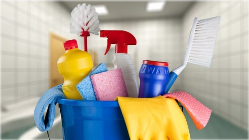 Professional office cleaners maintaining a workspace in W4
